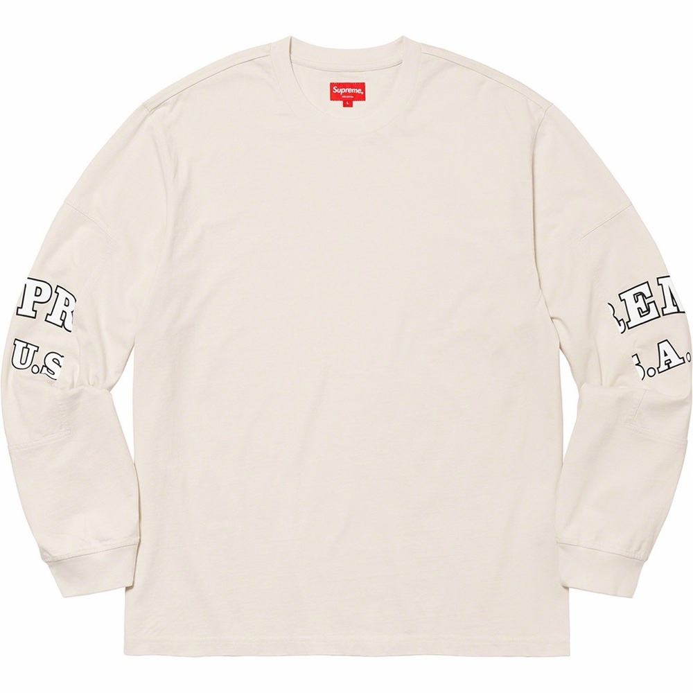 Supreme Cream Long Sleeve Tee with Red Neck Tag and Black Sleeve Text
